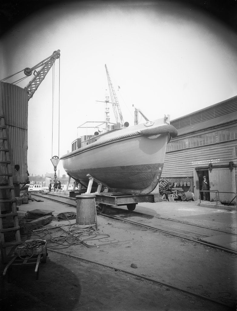 Detail of PGML 16 (1936) (Palestine Government Motor Launch) on a cradle outside the shipwright's shop at Woolston, being prepared for shipment to Palestine by unknown
