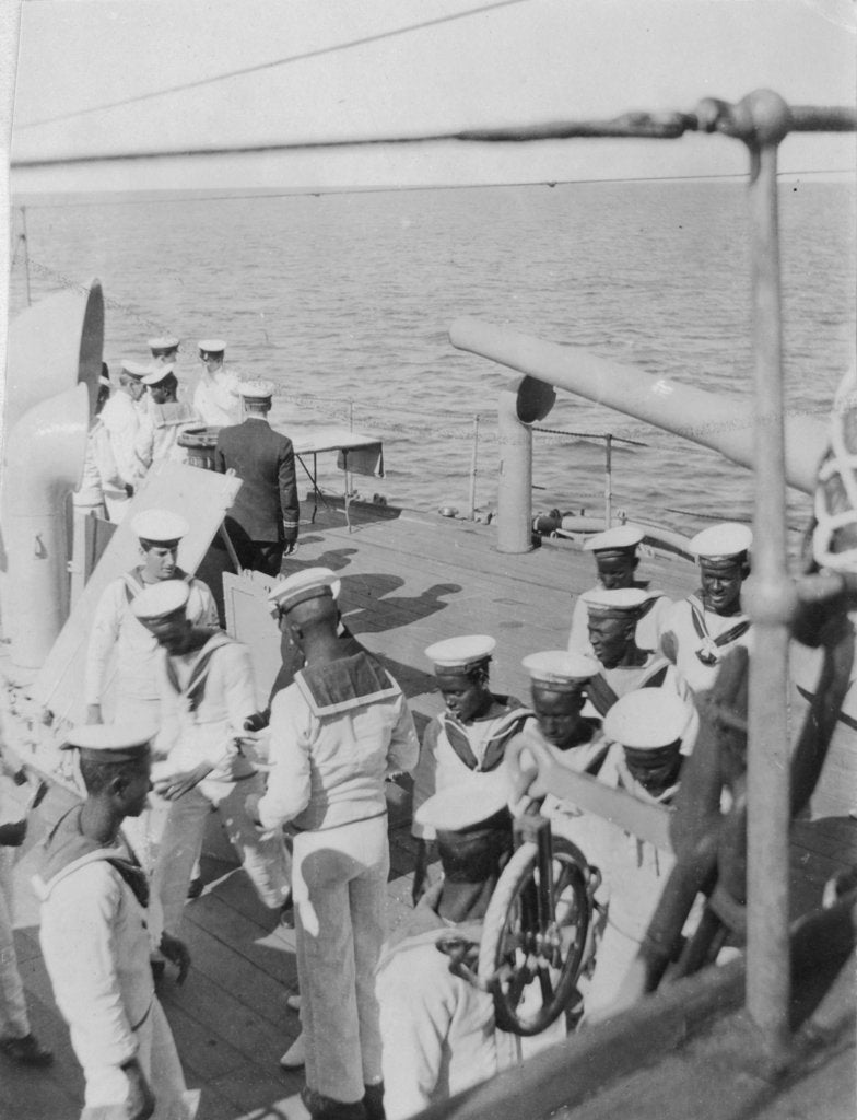 Detail of Somali crewmen on the quaterdeck of HMS 'Venus' in Singapore in 1916 by unknown