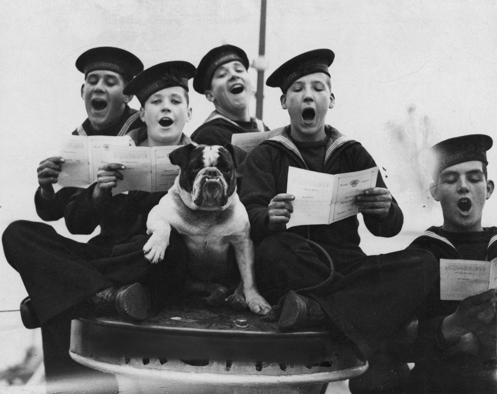 Detail of Warspite' boys singing, accompanied by the vessel's mascot by unknown