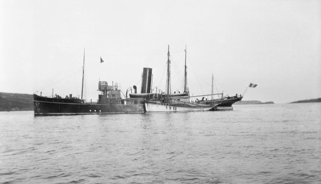 Detail of Fishery cruiser 'Muirchu' (Ih, 1908), ex 'Helga', with fishing vessels alongside by unknown