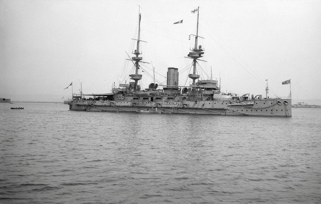 Detail of HMS 'Caesar' (1896), battleship, at anchor, awning rigged aft by unknown