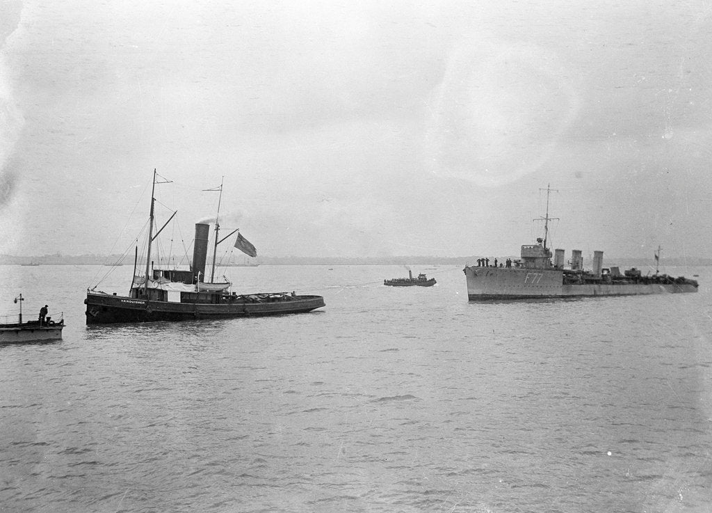 Detail of Rescue tug HMS 'Vanquisher' (1899) entering the floating dock at Harwich with the mined destroyer 'Thisbe' (1917) in tow by unknown