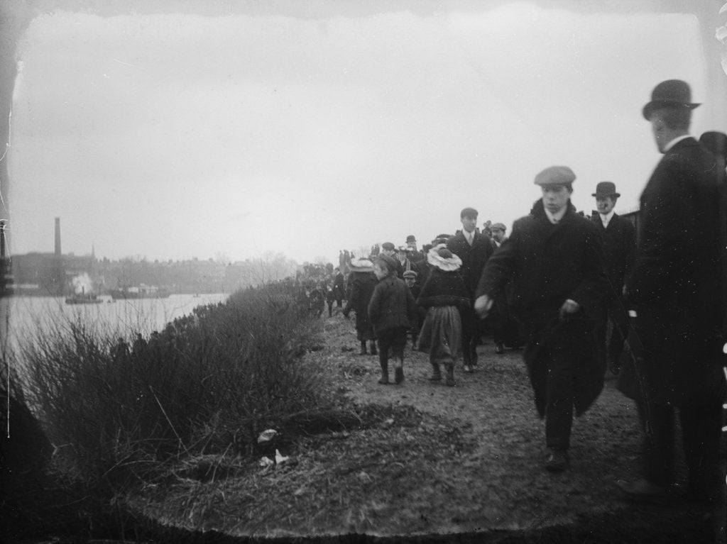 Detail of Spectators on the tow path on the south bank of the Thames near Hammersmith Bridge on Boat Race Day, 1907 by unknown
