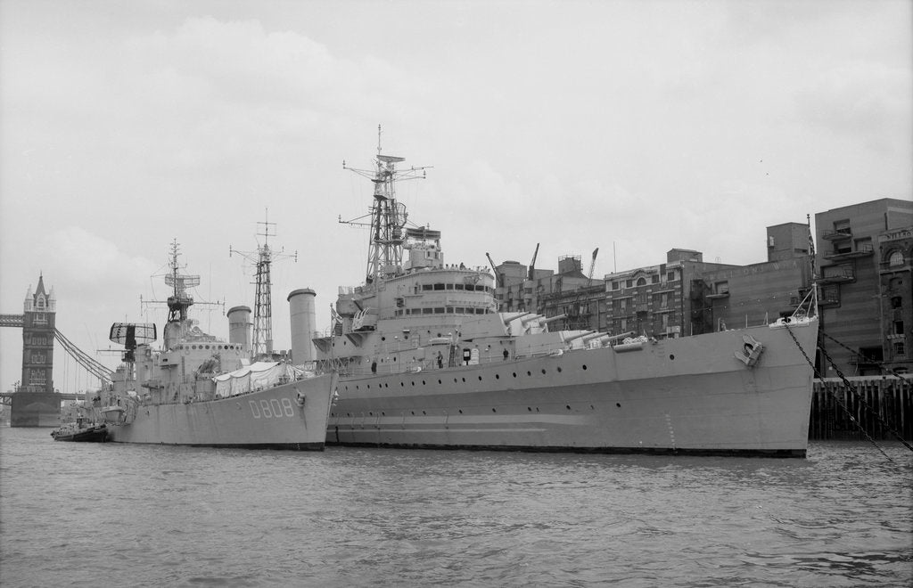 Detail of HMS 'Belfast' (1938) berthed at Symon's Wharf, Pool of London with the Dutch destroyer 'Holland' alongside by unknown