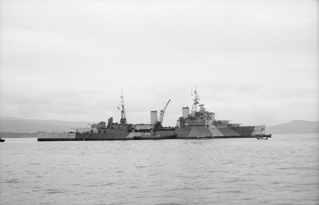 Detail of HMS 'Bermuda' (1941) at anchor in the Clyde, preparing for refit by unknown