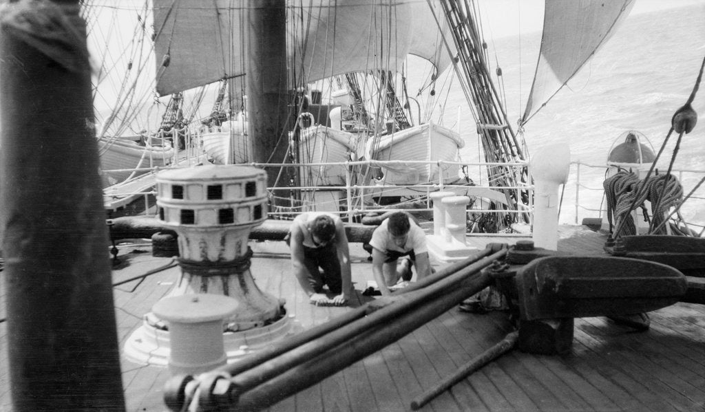 Detail of 'Herzogin Cecilie' (launched 1902) under sail, two seamen are holystoning the deck, 1928 by Gustaf Erikson