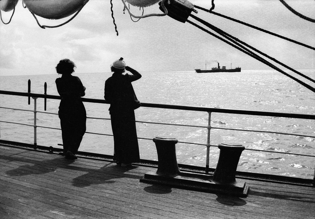 Detail of Elisabeth Jacobsen (right) and Ruby de Cloux at the poop rail looking towards the steamship 'Santarosa' (1905) by Alan Villiers