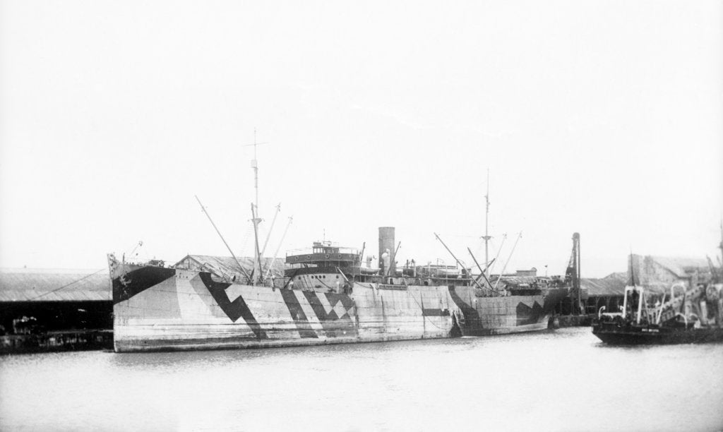 Detail of General cargo ship 'Vestalia' (Br, 1912) S. S. Co Ltd (Gow Harrison & Co), at quayside, camouflaged by unknown