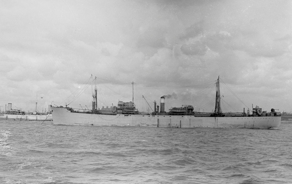 Detail of 'Empire Lancer' (Br, 1942) anchored at port by unknown