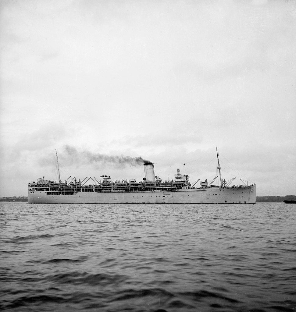 Detail of 'Ranchi' (Br, 1925), under tow as a troopship by unknown