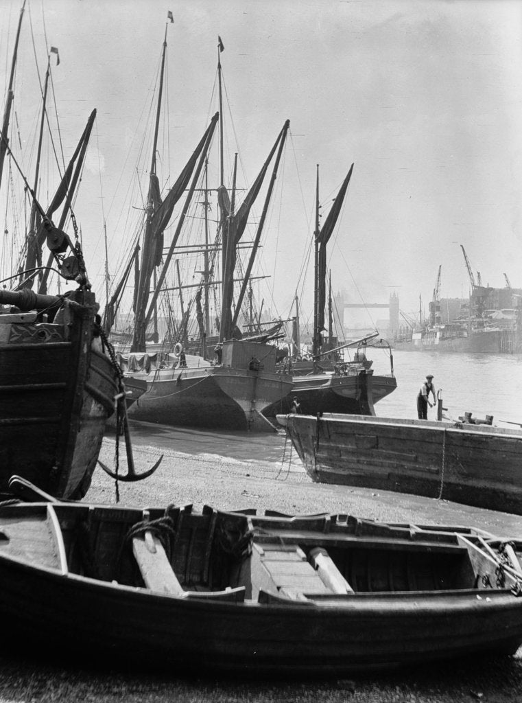 Detail of The Thames at low water with various crafts beached on the Southbank and Tower Bridge in the background. by Eagar