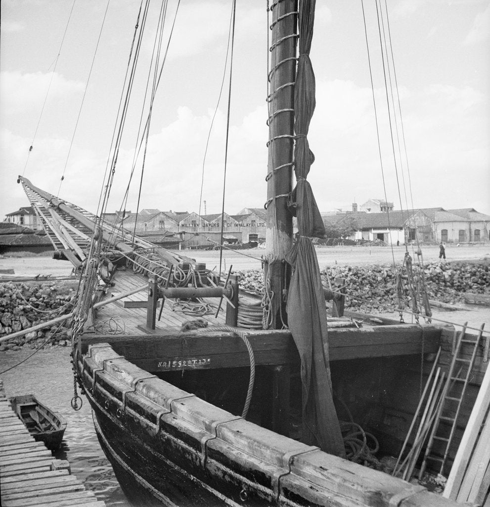 Detail of The forepart of a Tongkung type junk alongside a landing stage at Singapore by David Watkin Waters