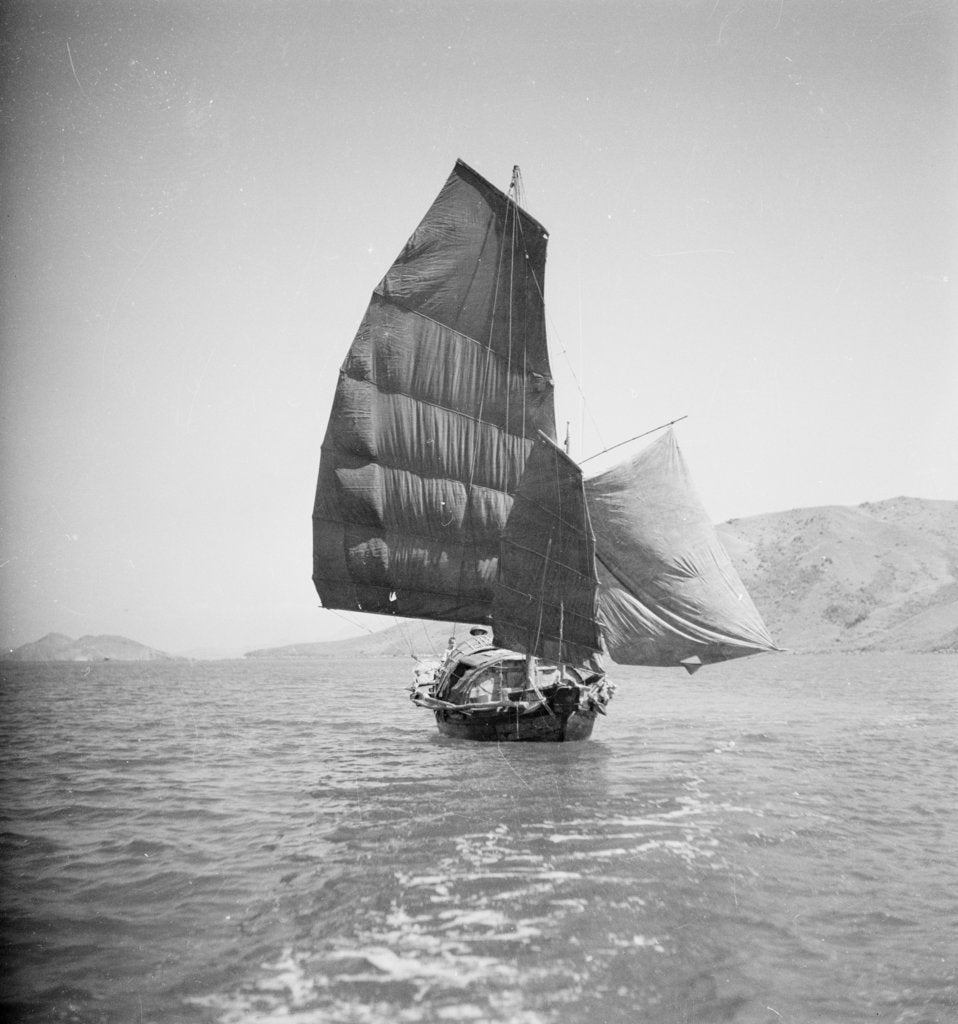 Detail of A bow view of a cargo sampan under sail in Tolo Harbour, Hong Kong by David Watkin Waters