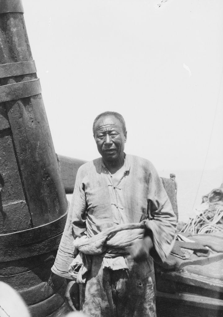 Detail of An elderly man on board an Antung trader type junk anchored at Weihaiwei by David Watkin Waters