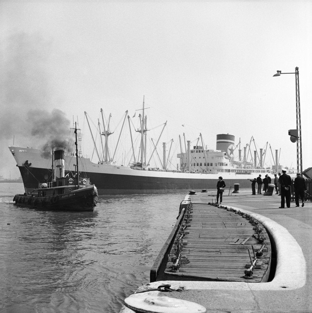 Detail of The Blue Star Line's 'Auckland Star'entering the King George V Dock in April 1964, assisted by the tug 'Atlantic Cock'. The 'Auckland Star' remained in service until 1978. by Grierson Collection