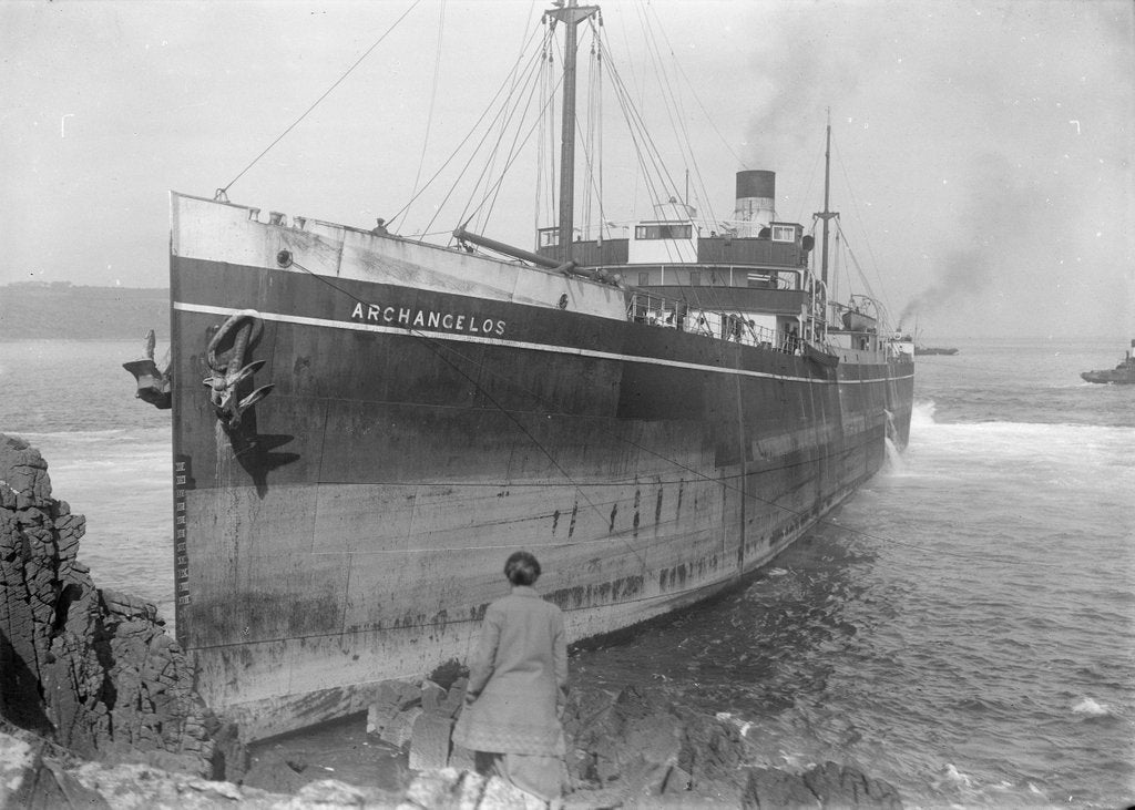 Detail of The cargo ship Archangelos (1918) with tugs in the background by Gibson & Sons of Scilly