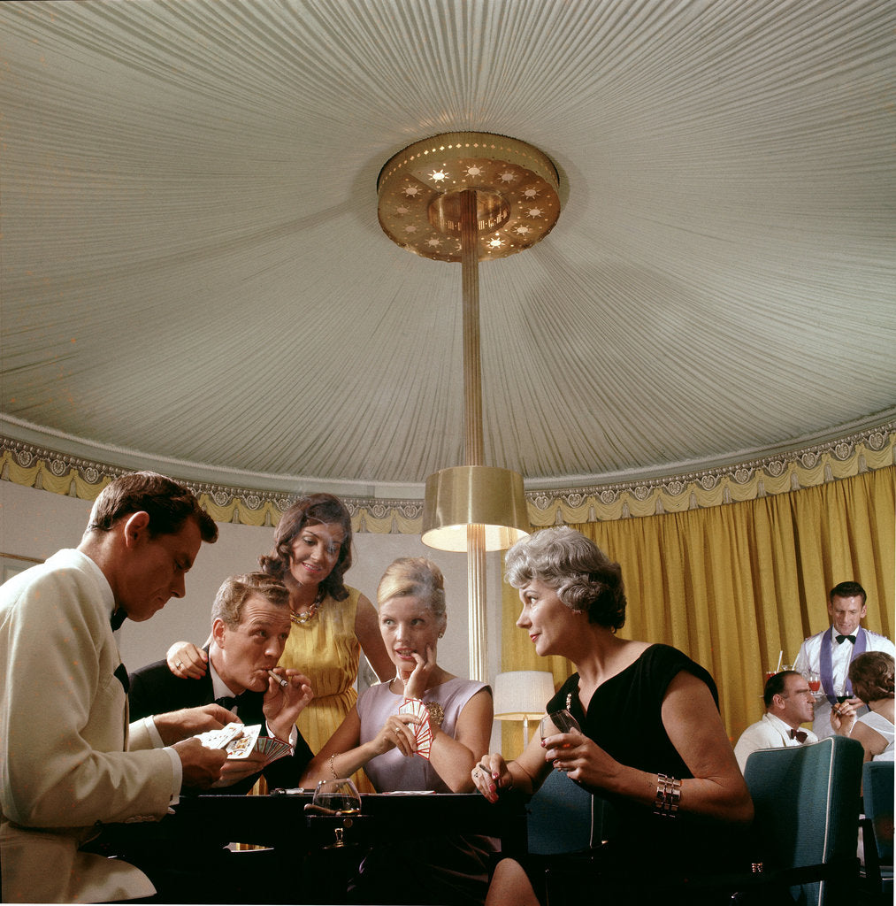 Detail of Passengers in smart evening dress, aboard an unspecified cruise liner, enjoy the thrilling distraction of a card game by Marine Photo Service