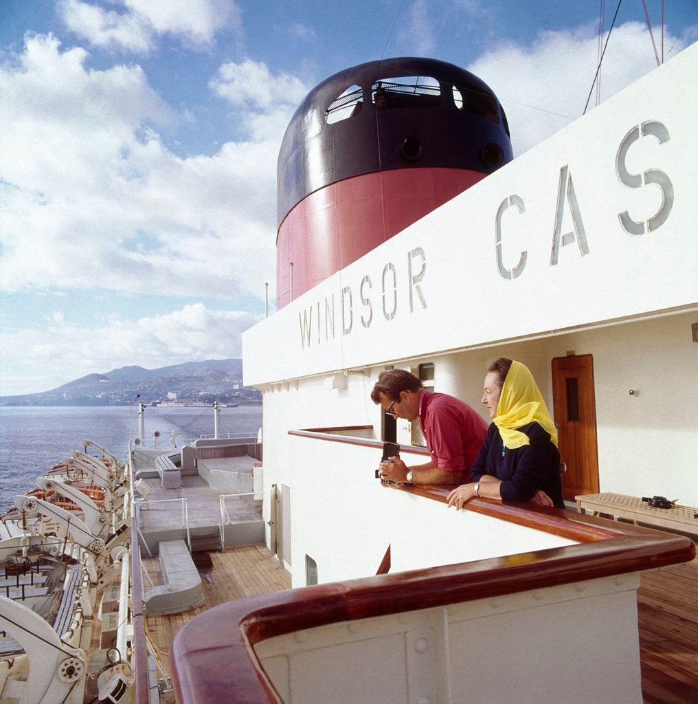 Detail of Two passengers enjoy the view from the upper deck of Union-Castle liner 'Windsor Castle' by Marine Photo Service
