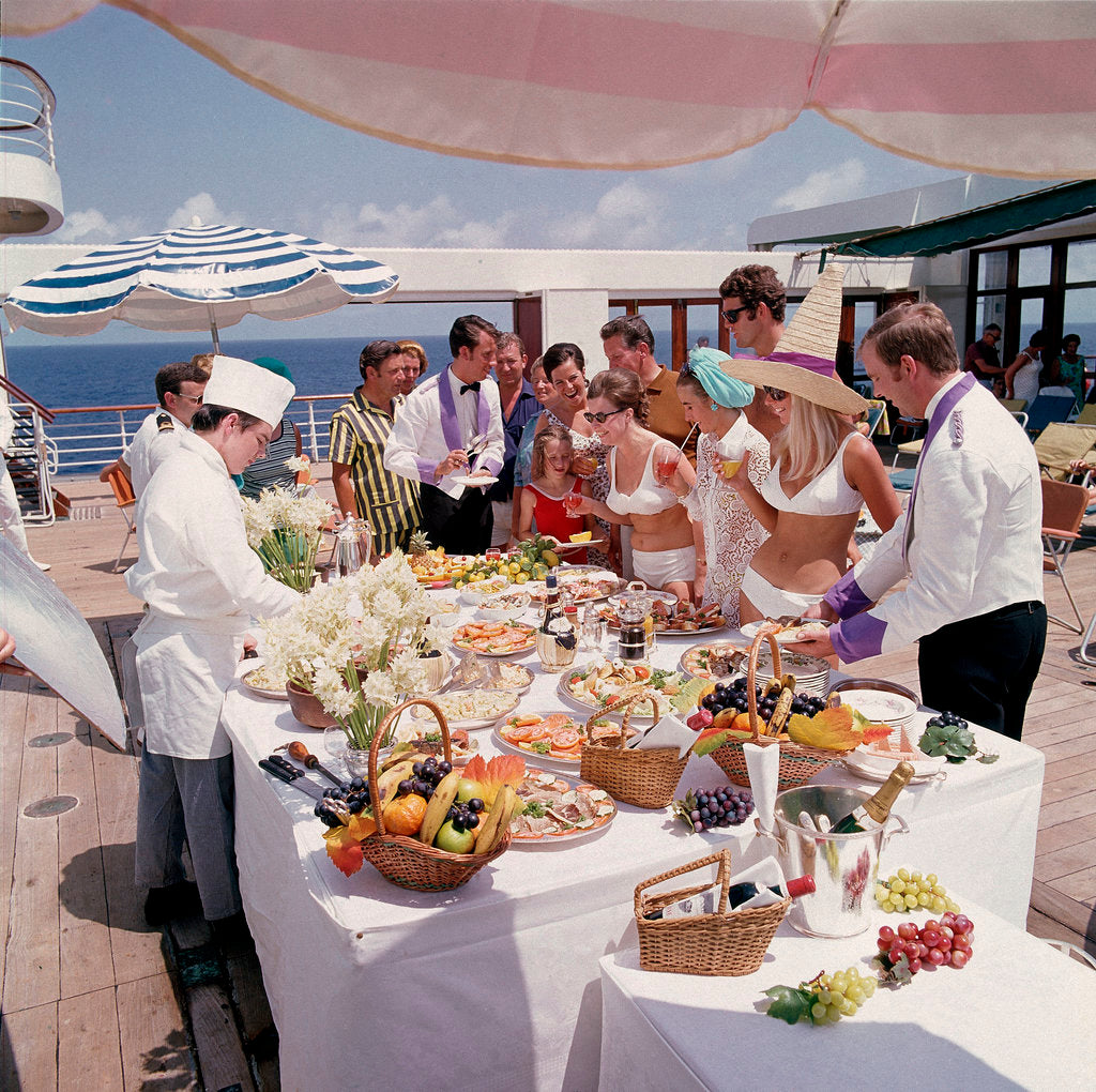 Detail of Fine weather allows passengers to enjoy a casual buffet on deck - no need to dress for dinner on this occasion! by Union Castle Line Collection