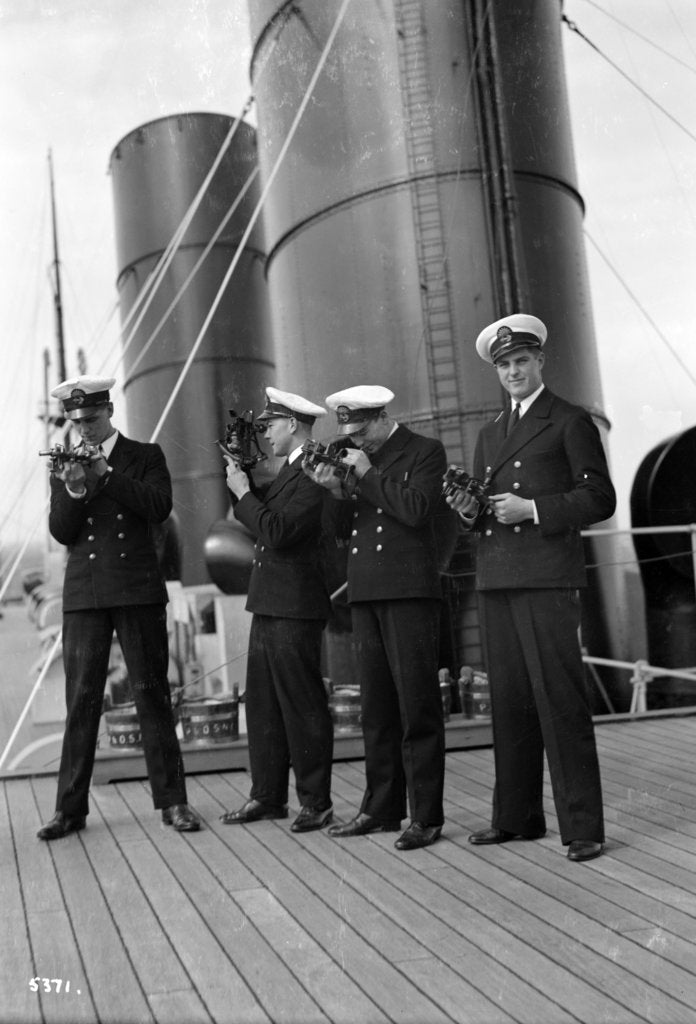 Detail of Four P & O cadets of the 'Viceroy of India' (1929) on the starboard side of the Bridge Deck with their sextants by Marine Photo Service