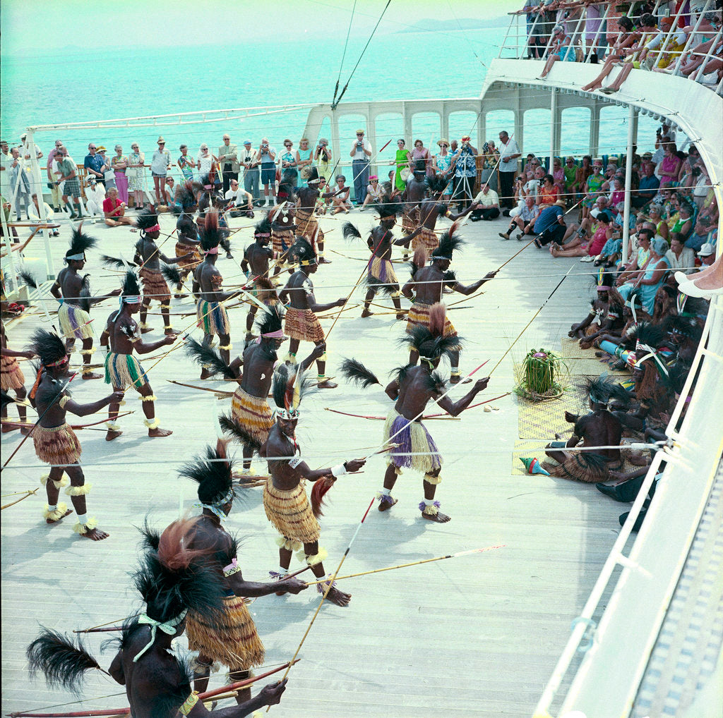Detail of Local dancers from Roratonga, Cook Islands performing aboard the 'Kungsholm' by Marine Photo Service