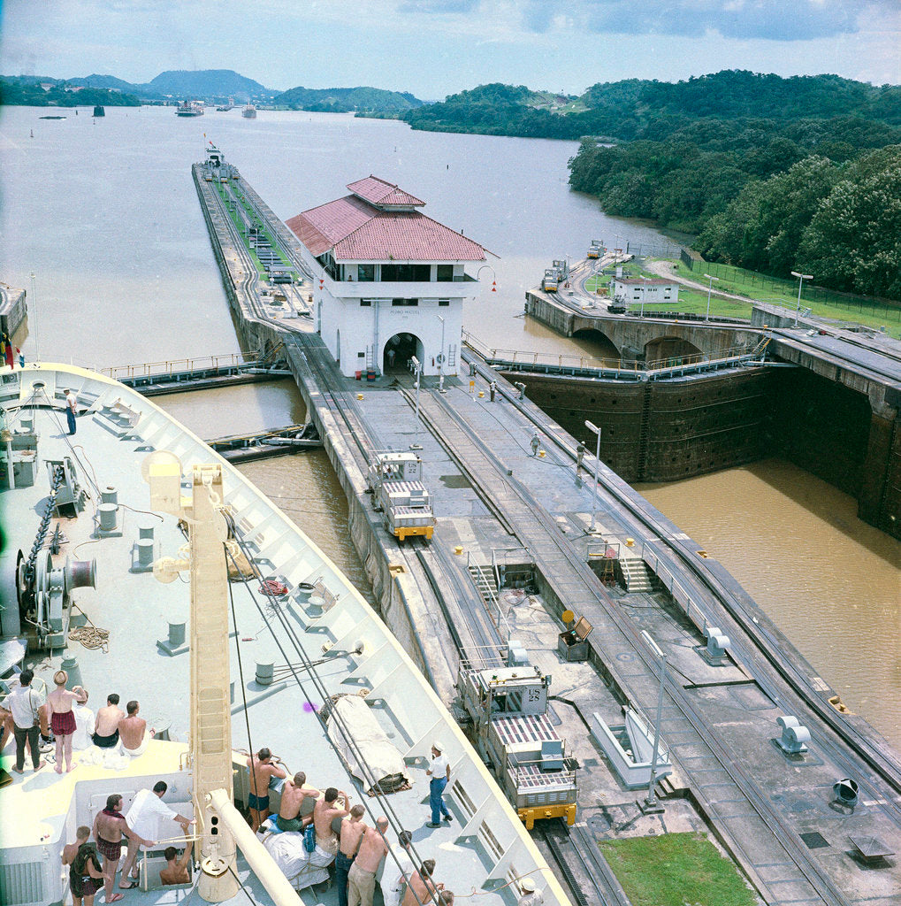 Detail of A view from the bridge of 'Gripsholm' (1957) or 'Kungsholm' (1966) of the Pedro Miguel Lock, Panama Canal, with the Miraflores Lock in the background. by Marine Photo Service