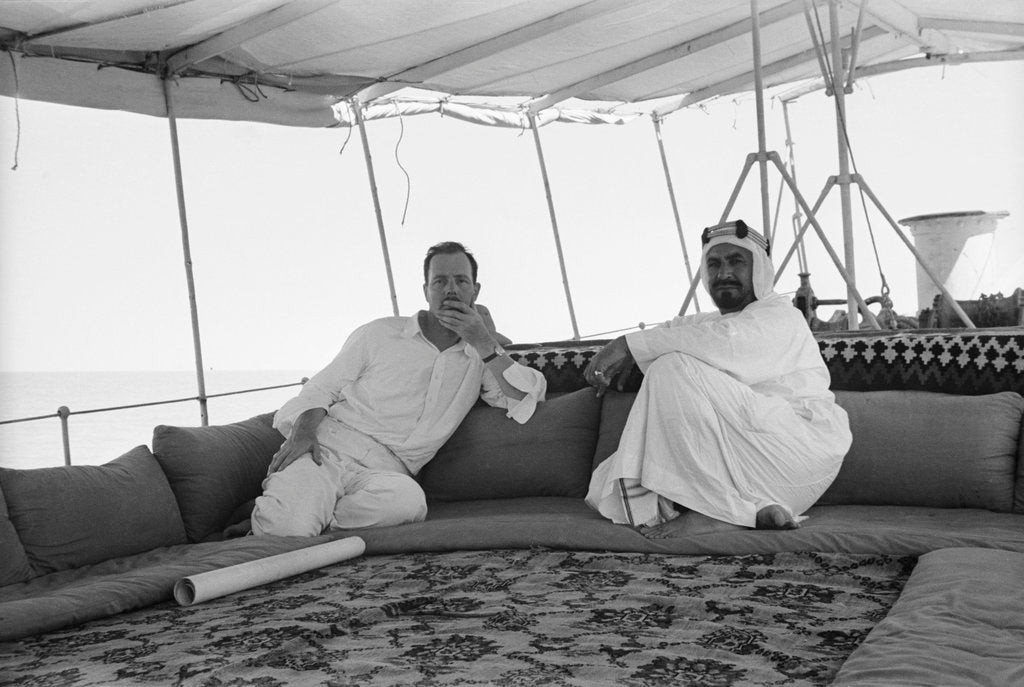 Detail of Sheikh Ahmad bin Jabir al-Sabah, Ruler of Kuwait, seated with the British Political Agent, Major A. C. Galloway by Alan Villiers