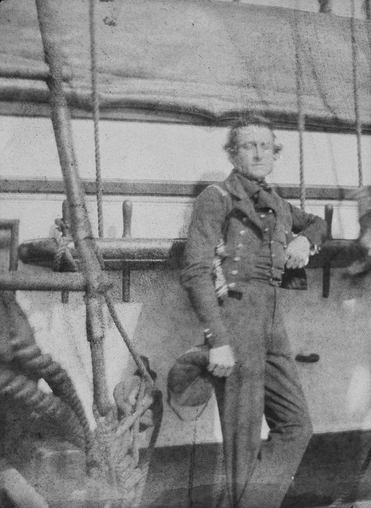 Detail of An unidentifed naval officer(?) standing by the belaying pin rail on the port side of the 80-gun three-decker HMS 'Superb' (1842). Inversed digital file to create b&w positive by William Henry Fox Talbot; Nicolaas Henneman